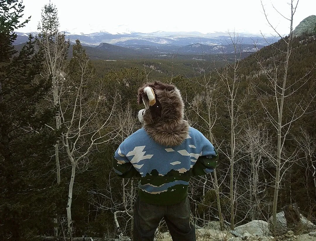 Photo by spoon on February 13, 2026. May be an image of cloak, parka, Mount Rushmore and text.