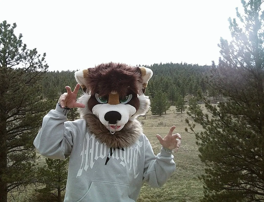 Photo by spoon on April 01, 2026. May be an image of bear, headdress, costume and text.